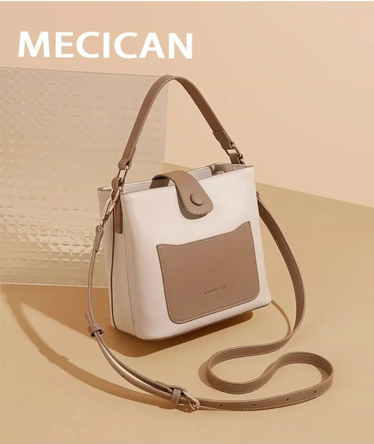 Un sac tendance avec un design bicolore contrasté et une large bandoulière